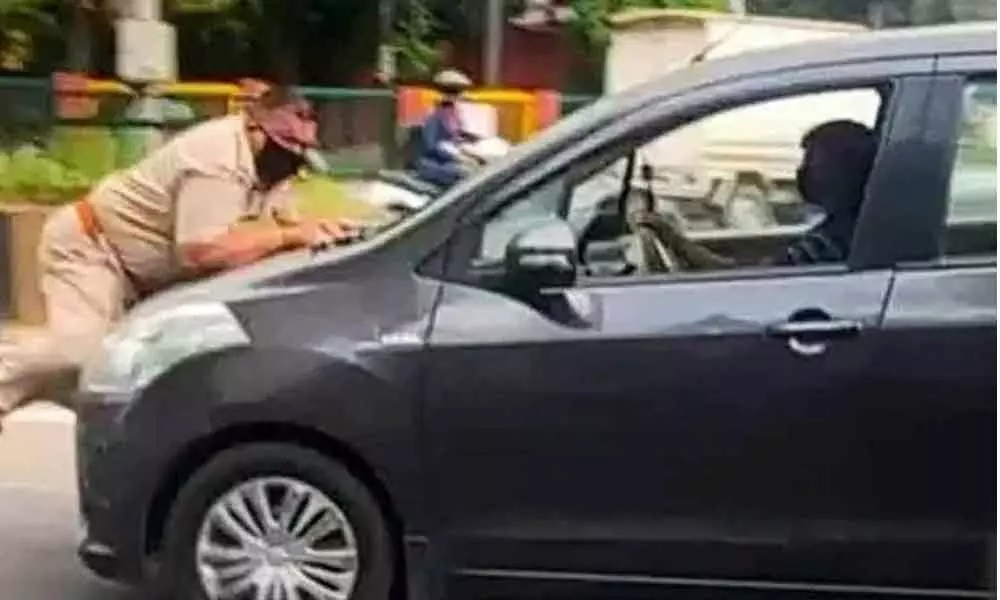 Policeman dragged on bonnet in Punjab amid lockdown