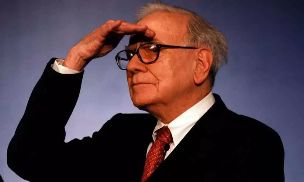 Warren Buffetts co posts $50-billion loss