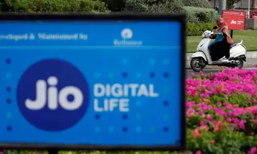 Reliance to sell $750 million stake in unit to Silver Lake, on track to cut debt