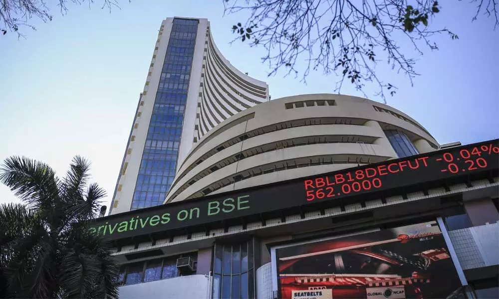 Benchmark domestic stocks closed with marginal gains amid positive global cues