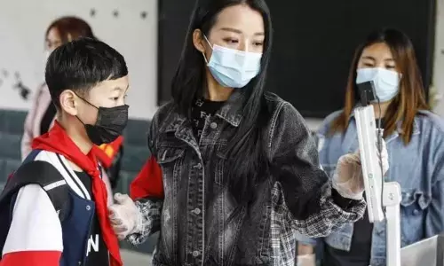 How does the coronavirus infect children? And should they be in school?