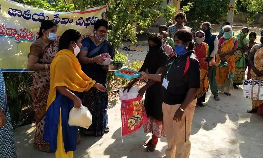 Tirupati: SPMVV women studies dept distributes essentials