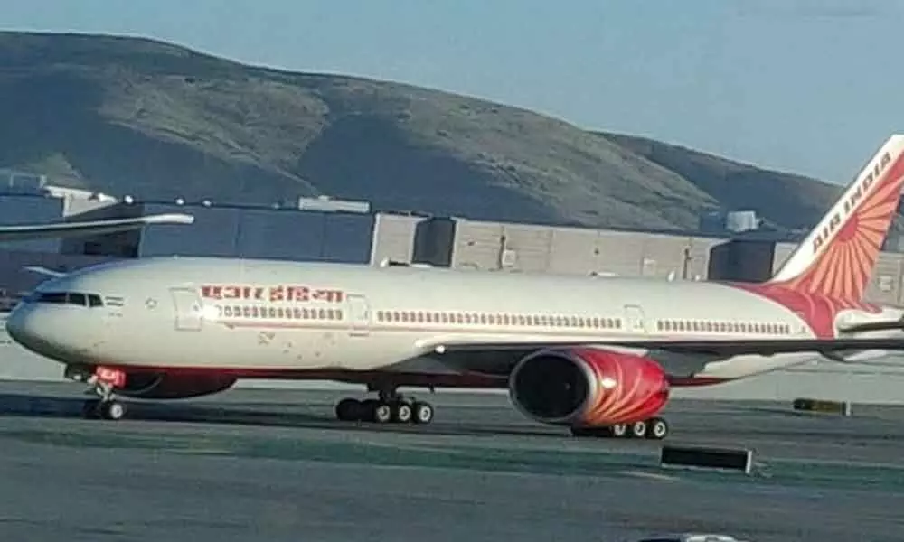 First Air India flight from US brings 225 stranded Indians