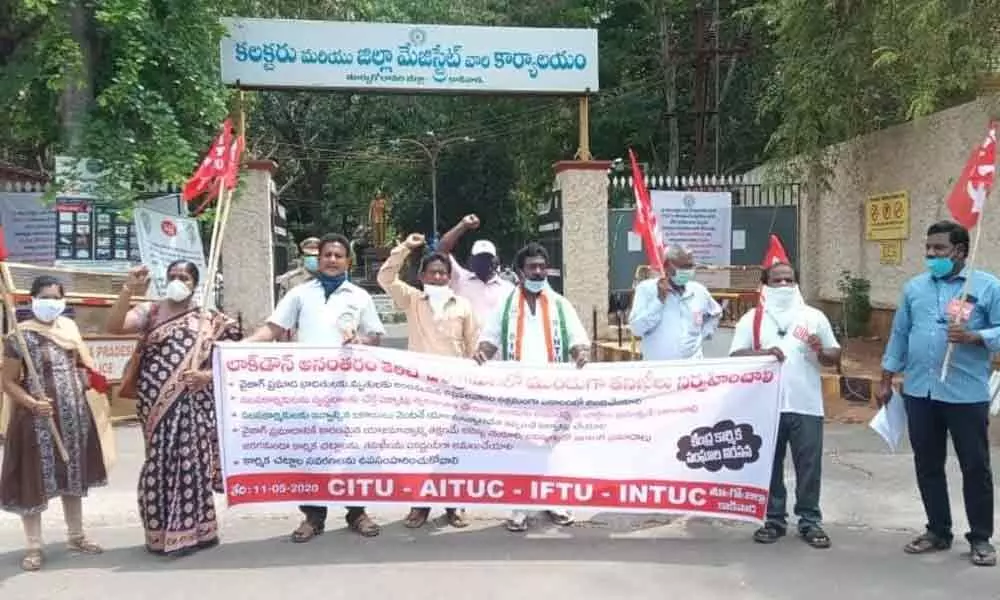 Kakinada: Trade union activists stage dharna demanding action against LG Polymers