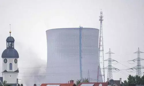 Former German nuclear plant towers demolished in morning blasts
