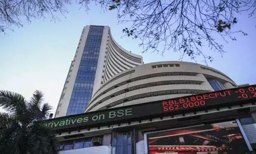 Markets end lower as bank stocks slide