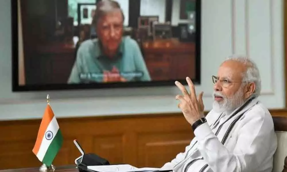PM Modi discusses Covid-19 situation and vaccine to cure it with Bill Gates