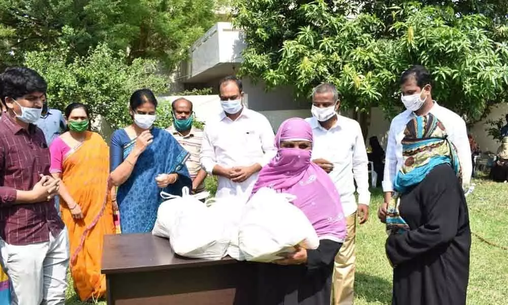 Hyderabad: Sabita Indra Reddy distributes relief kits