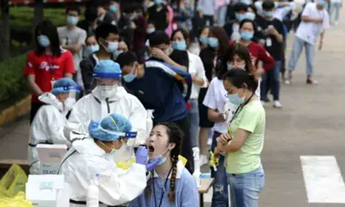 China reports 21 new COVID-19 cases