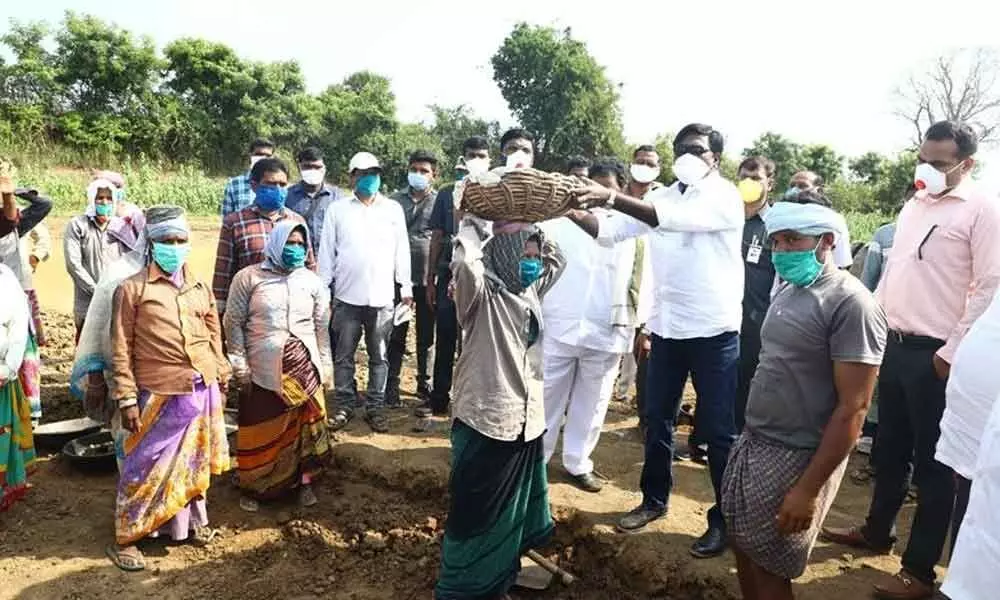 Minister Ajay inspects NREGS works in Sathupalli