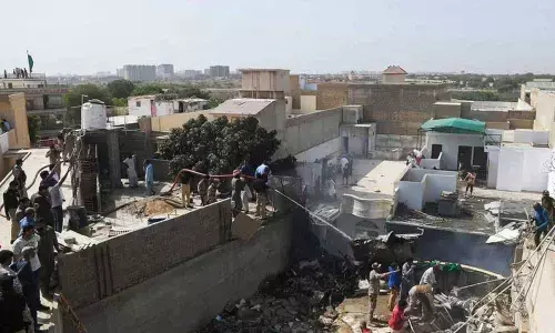 Photos: Pakistan International Airlines plane from Lahore crashes in Karachi