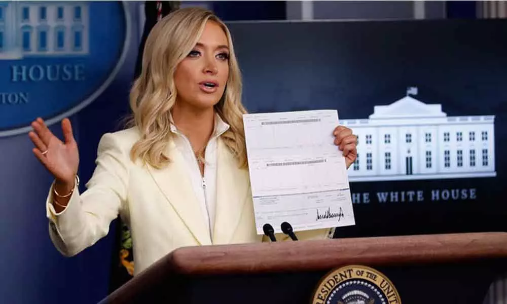 White House Press Secretary Kayleigh McEnany accidentally reveals Trumps bank details