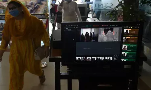 Authorities are also listening in to the calls of Covid-19 patients to monitor whether their contacts are talking about having symptoms.