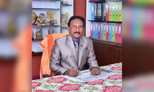 PSR & VN DAV High School head master B Nagendra Raju