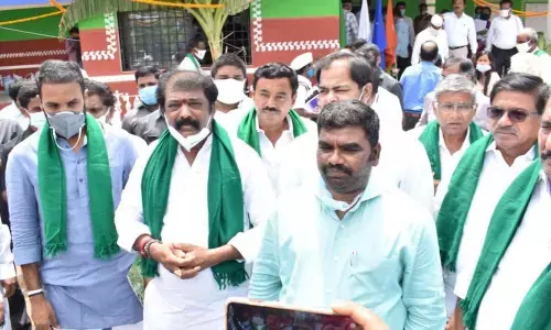 Labour Welfare Minister Gummanur Jayaram addressing media personnel after inaugurating Rythu Bharosa Kendra at Pandurangapuram village in Nandyal on Saturday. District Collector, G Veera Pandiyan and others are also seen