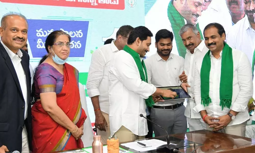 Chief Minister YS Jagan Mohan Reddy inaugurating the Rythu Bharosa Kendras at his camp office in Tadepalli on Saturday.