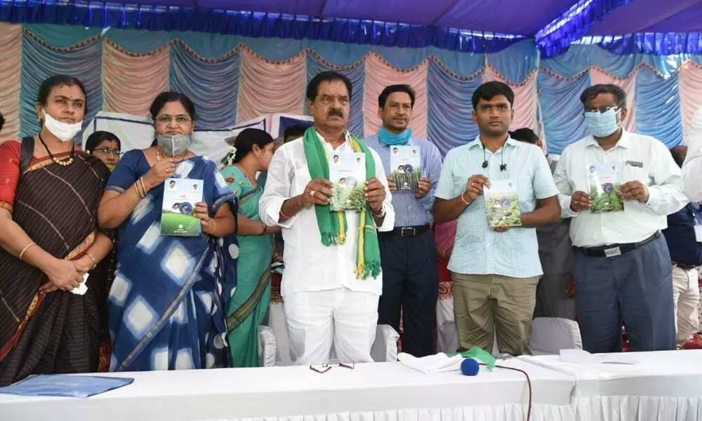 Deputy Chief Minister K Narayana Swamy and others during the inauguration of Rythu Bharosa Centre at Velkur village