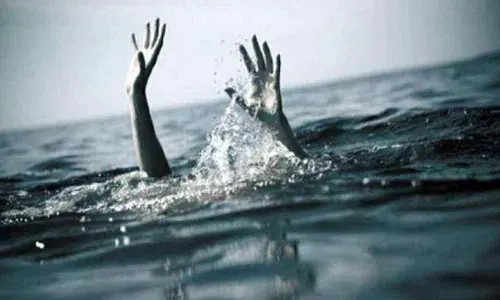 Two brothers drowned to death in a pond at Gudivada in Krishna district
