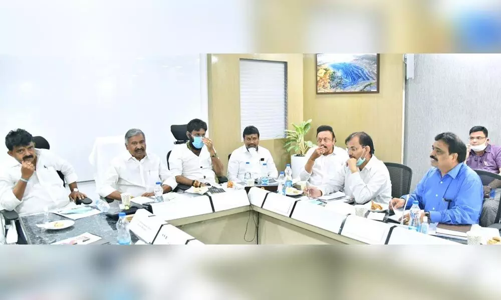 Minister for mines and geology Peddireddy Ramachandra Reddy reviewing the sand policy with other ministers and officials at the APMDC office