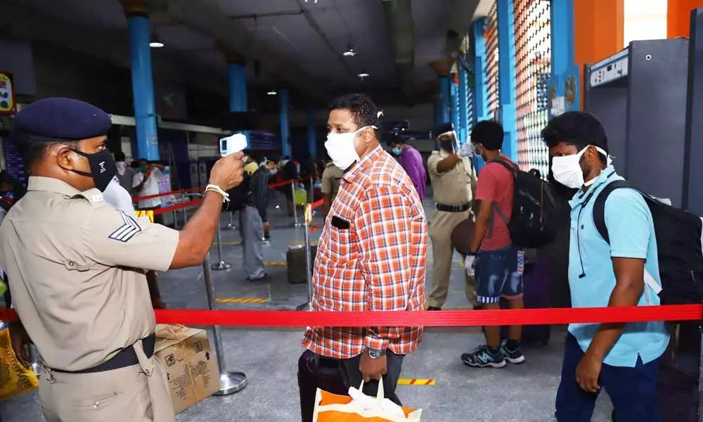 Thermal screening being done for passengers at Tirupati Railway Station on Monday
