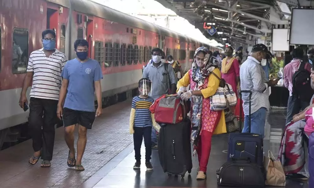 Passengers arriving at Visakhapatnam railway station on Monday to board Godavari Express