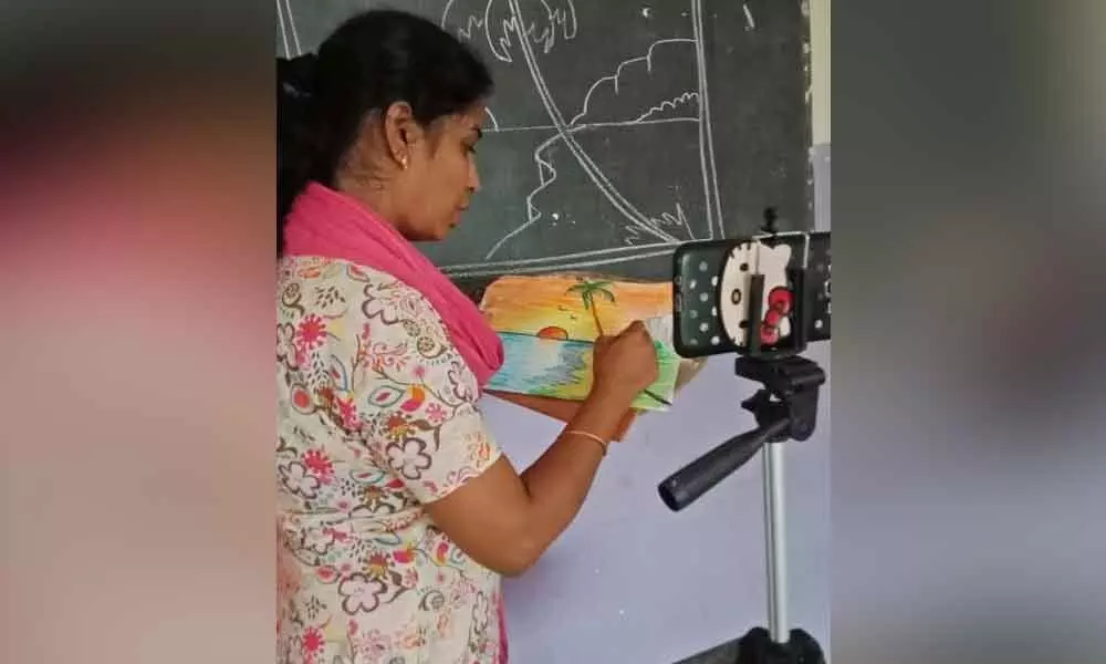 A teacher imparting craft classes through online system in Visakhapatnam