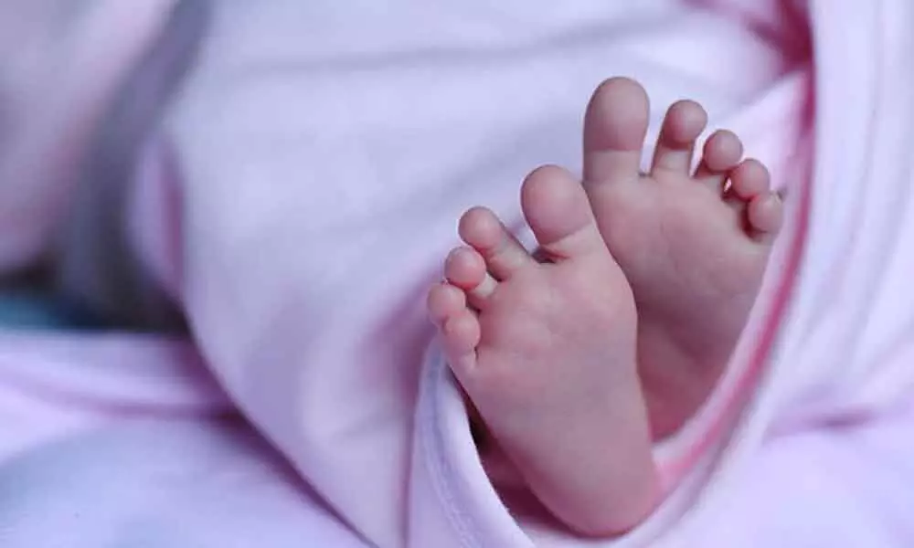 Woman delivers baby while standing in queue for Covid test