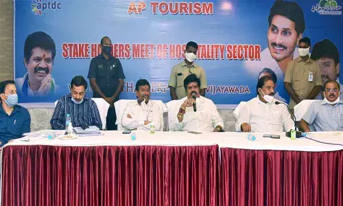 Tourism Minister Avanti Srinivas interacting with stakeholders of hospitality sector at the Berm Park in Vijayawada on Thursday (below) Stakeholders participating in meeting