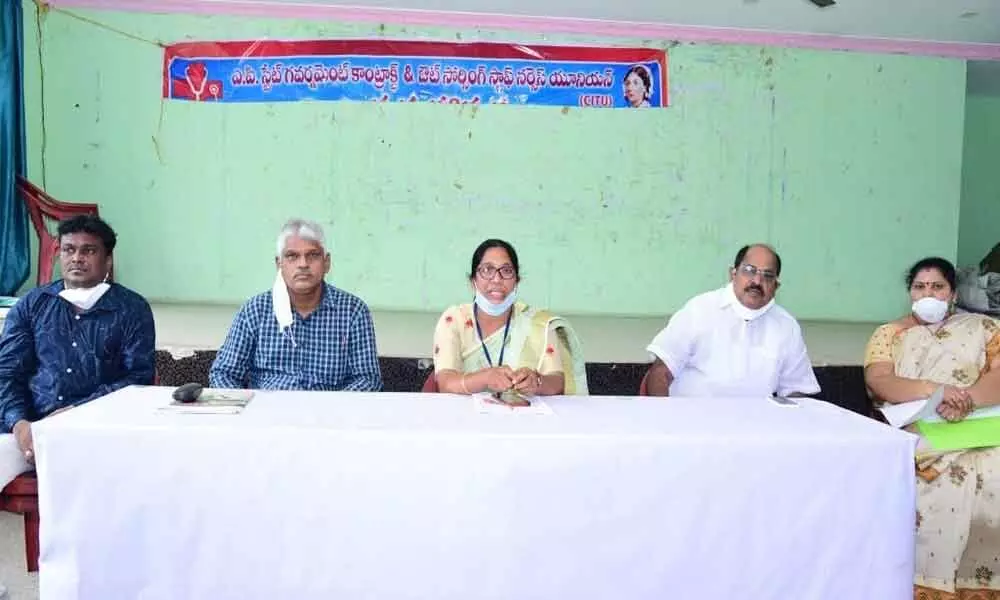 Contract and Outsourced Staff Nurses’ Association President G Dayamani addressing media at the Press Club in Vijayawada on Thursday
