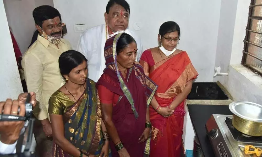 Speaker Pocharam Srinivas Reddy and R&B Minister Vemula Prashanth Reddy at a house-warming function