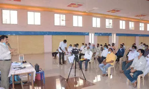 EO K S Rama Rao addressing a meeting of the organisers of private choultries at Srisailam temple on Sunday