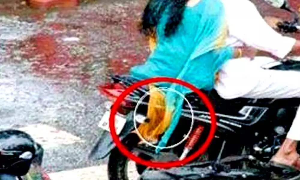 Woman dies after her dupatta gets entangled in bikes wheel in Kadapa