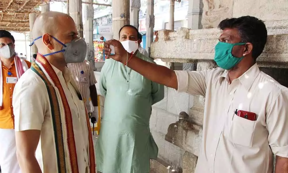 Thermal screening being done to TTD  EO Anil Kumar Singhal during  his visit to  Sri Govindaraja Swamy temple  in Tirupati  on Monday