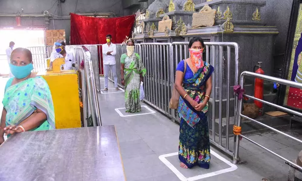 Devotees maintain social distance at Yadadri temple on Monday      Photo: Mucherla Srinivas