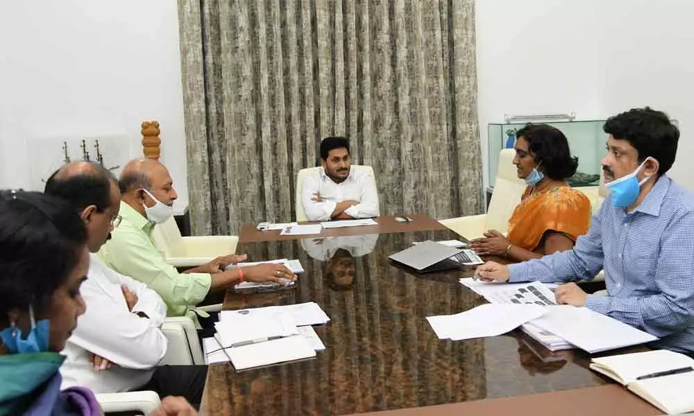 Chief Minister Y S Jagan Mohan Reddy holding a review on revenue department at his camp office on Monday