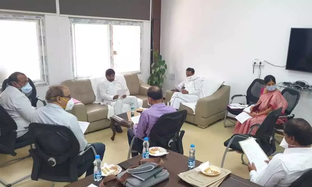 Ministers Jagadish Reddy and Eatala Rajender reviewing the issues of Nalgonda and Suraypet medical colleges in Hyderabad on Monday