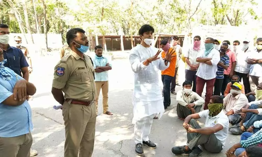 Congress leader M S Raj Tagore addressing striking contract workers of Kesoram Cement company in Ramagundam on Tuesday