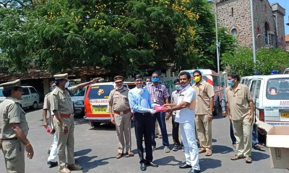Covid-19 protection kits being distributed to drivers in Visakhapatnam on Wednesday