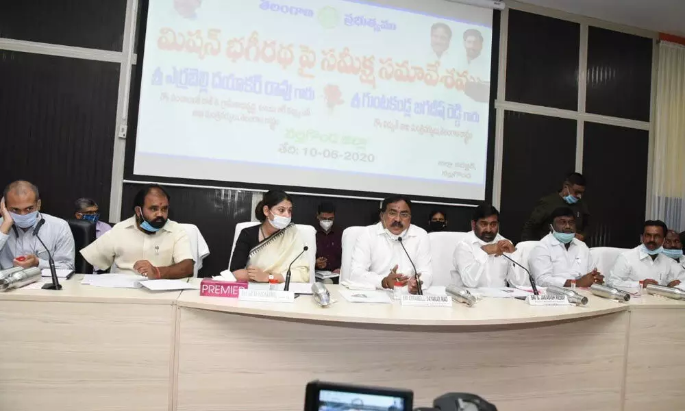 Panchayath Raj Minister Errabelli Dayakar Rao addressing the engineers on Mission Bhagiratha at a review meeting in Nalgonda on Wednesday.
