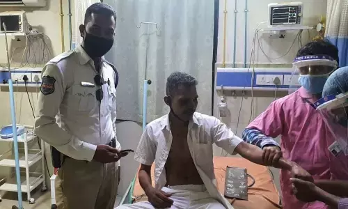 Doctors checking the car driver at a private hospital in Nalgonda on Thursday. Traffic constable Hafeez also seen