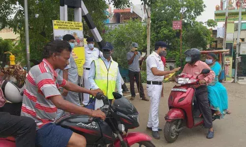 As a part of the ILCA Day, pamphlets being distributed at LC gates in Visakhapatnam on Thursday