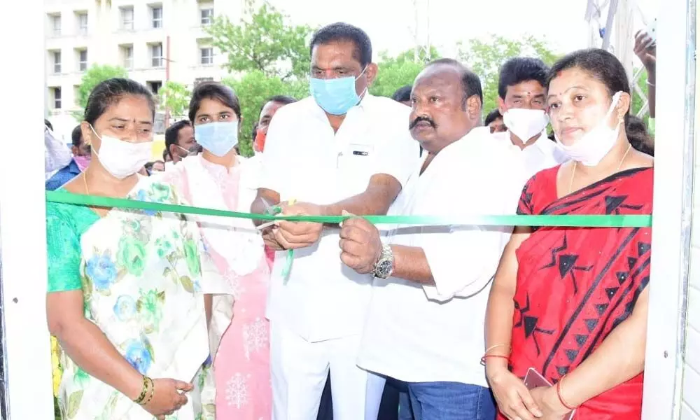 BC Welfare and Civil Supplies Minister G Kamalakar and City Mayor Y Sunil Rao inaugurating Smart Public Toilet