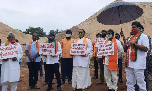 BJP leaders staging protest against the government for failure to supply sand to people on Friday