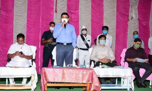 District Collector Dr A Sharath speaking at a general body meeting of Banswada Municipal Corporation on Friday