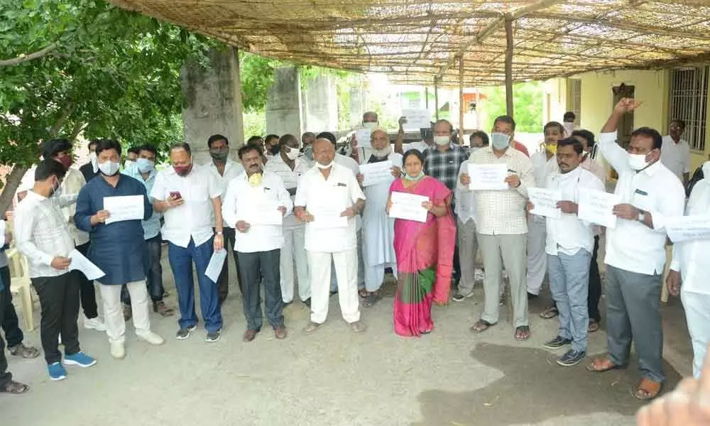 TDP leaders staging protest at party office in Kurnool on Friday condemning the arrest of former minister Atchannaidu