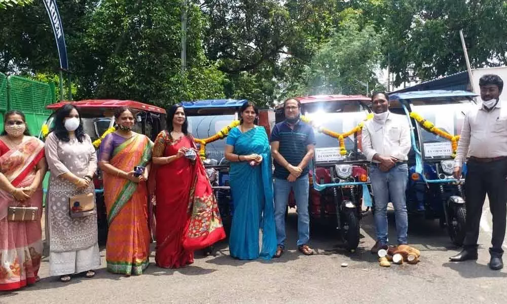 ECoRWWO team along with DRM Chetan Kumar Shrivastava at the launch of e-vehicles at Waltair Division in Visakhapatnam