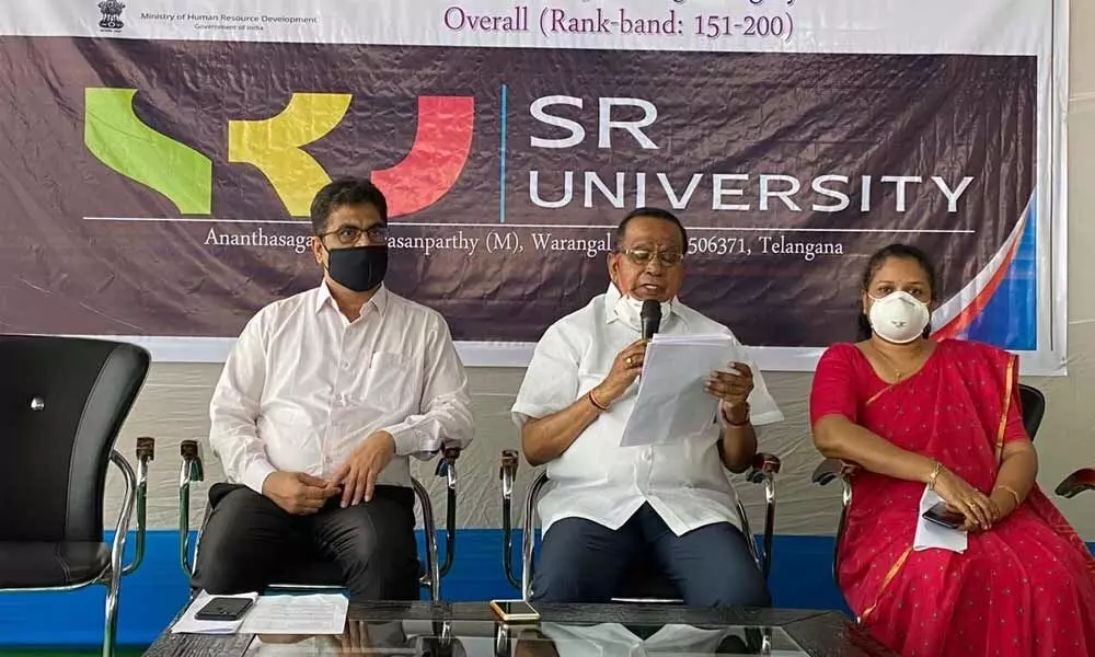 Dr V  Mahesh Principal, A  Varadha Reddy, chairman, SRES, Dr Archana Reddy, Dean Academics during the press meet in Warangal on Saturday