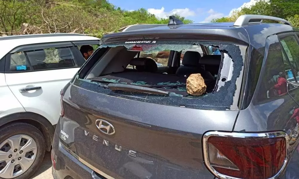 The damaged car of Minister Jagadish Reddy’s car at Undragonda village in Suryapet on Saturday