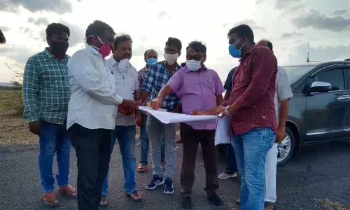 Prakasam collector Dr Pola Bhaskara inspecting lands for solar power plant in Rudrasamudram on Sunday