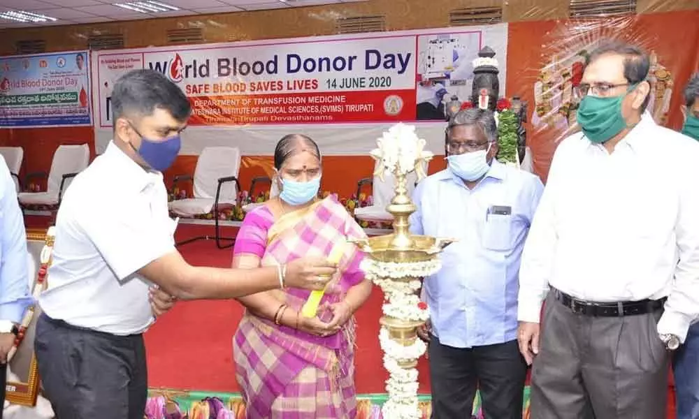District Collector Dr N Bharat Gupta lighting the lamp at the world blood donor day programme held in SVIMS in Tirupati on Sunday